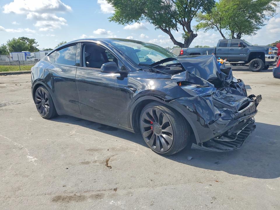 2025 Tesla Model y VIN 7SAYGDEF8SA348250 COPART salvage auction — FRONT END, FL, sold $13,500 on 2026-07-14 (photo 4)