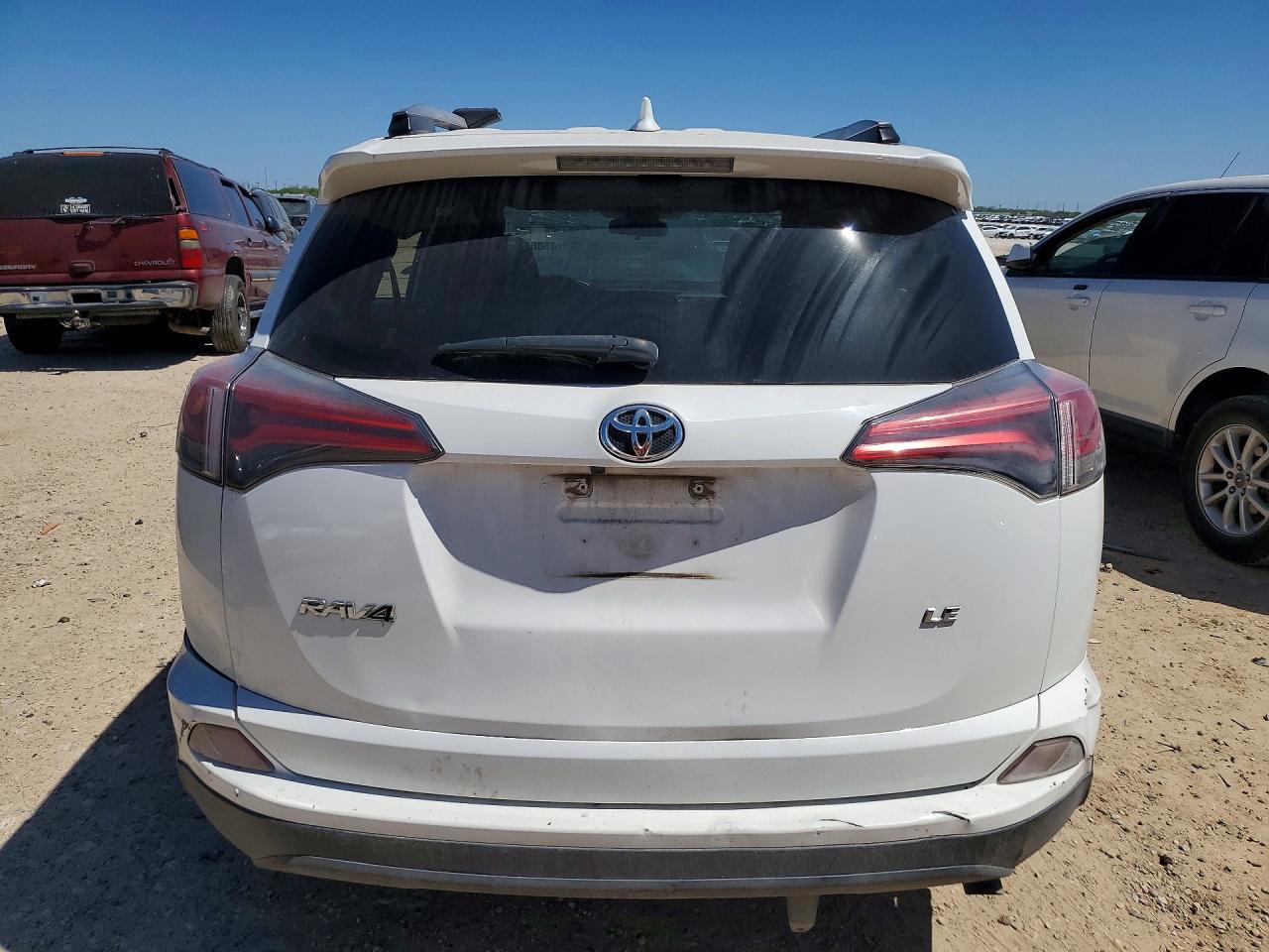 2018 Toyota RAV4 VIN JTMZFREV4JJ729595 COPART salvage auction — All Over, TX - CERTIFICATE OF TITLE, sold $5,600 on 2026-07-08 (photo 6)