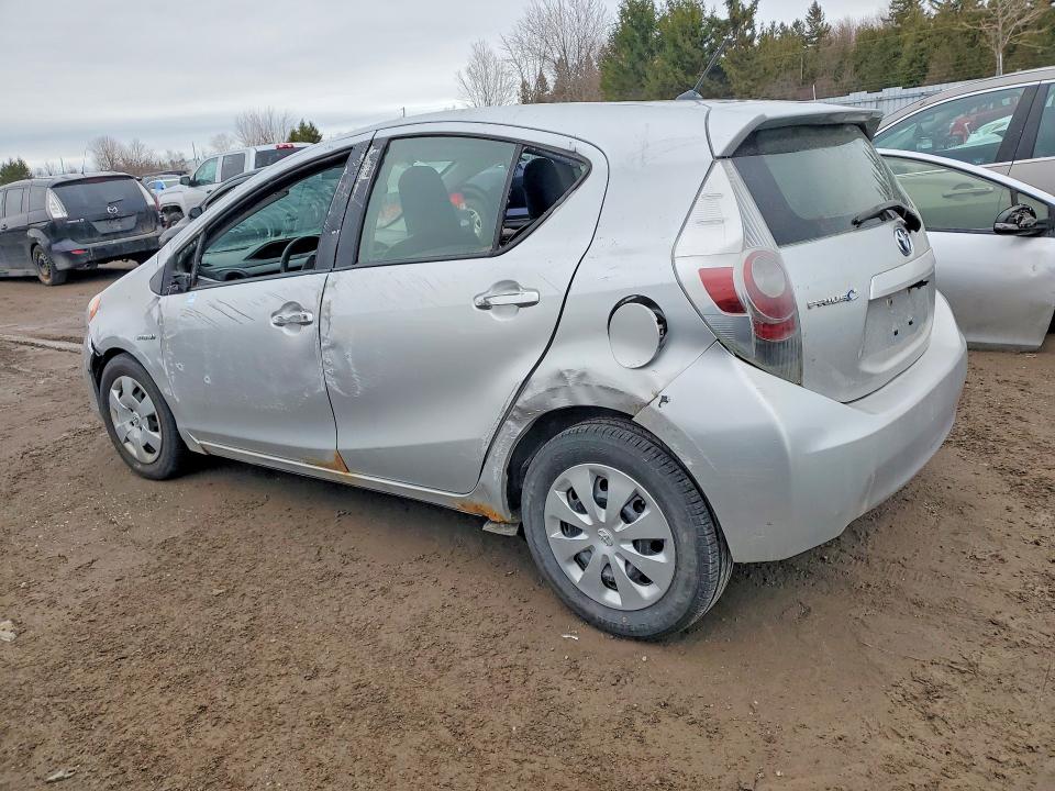 2013 Toyota Prius c VIN JTDKDTB37D1540208 COPART salvage auction — ALL OVER, On - Permit Irrepairable, sold $625 on 2026-07-07 (photo 2)