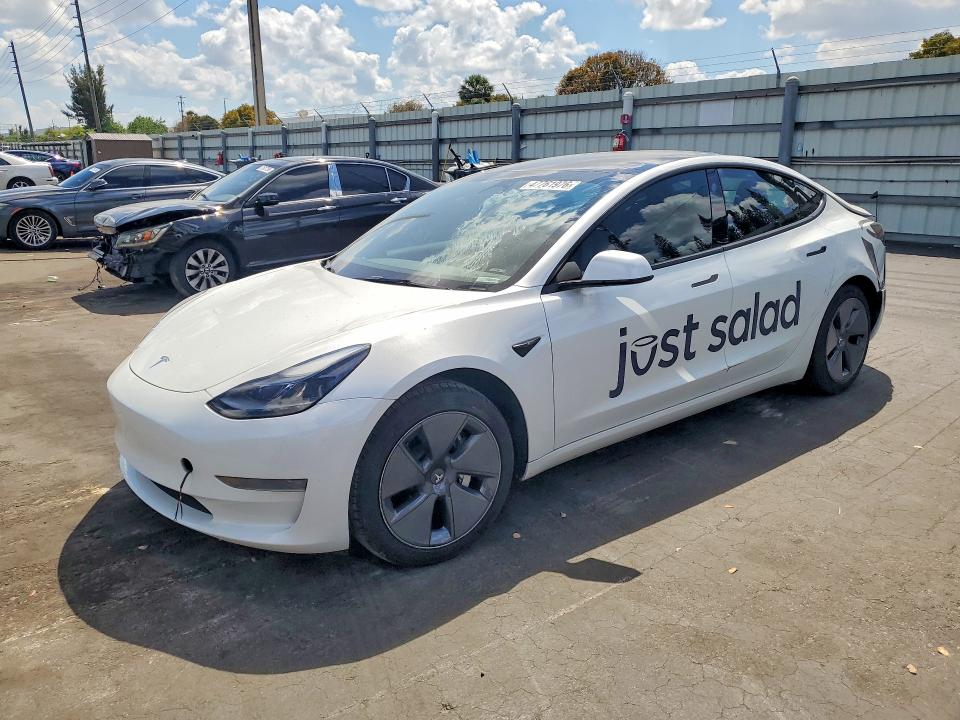 2023 Tesla Model 3 VIN 5YJ3E1EA9PF554834 COPART salvage auction — REAR END, Fl - Cert Of Title Slvg Rebuildable, sold $3,100 on 2026-07-13 (photo 1)
