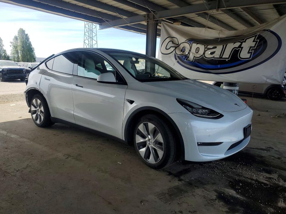2022 Tesla Model y VIN 7SAYGDEE7NF416133 COPART salvage auction — REAR END, Ca - Salvage Certificate, sold $10,400 on 2026-07-14 (photo 4)