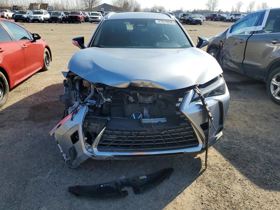2025 Lexus Ux VIN JTHUCJDH7S2003949 COPART salvage auction — FRONT END, Salvage Title, sold $14,200 on 2026-07-14 (photo 5)