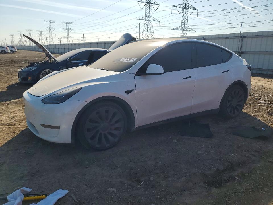 2022 Tesla Model y VIN 7SAYGDEF7NF407358 COPART salvage auction — FRONT END, Il - Salvage Certificate, sold $10,700 on 2026-07-07 (photo 1)