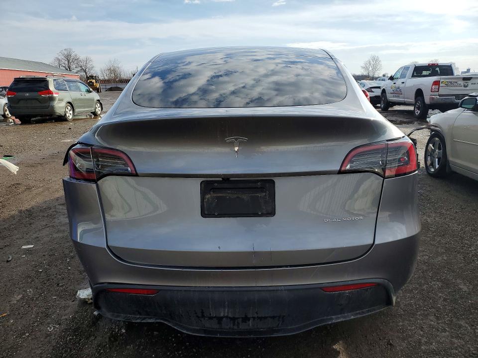 2025 Tesla Model y VIN 7SAYGAEE8SF229297 COPART salvage auction — UNDERCARRIAGE, Salvage Title, sold $14,200 on 2026-07-20 (photo 6)