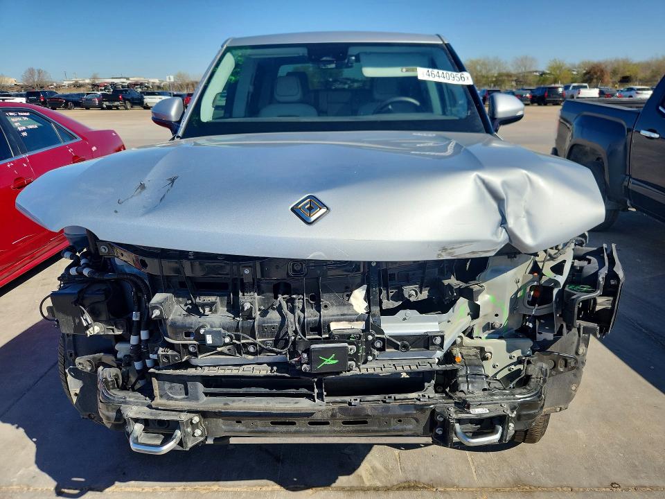 2023 Rivian R1t VIN 7FCTGAAA6PN021299 COPART salvage auction — FRONT END, TX - SALVAGE VEHICLE TITLE, sold $12,900 on 2026-07-09 (photo 5)