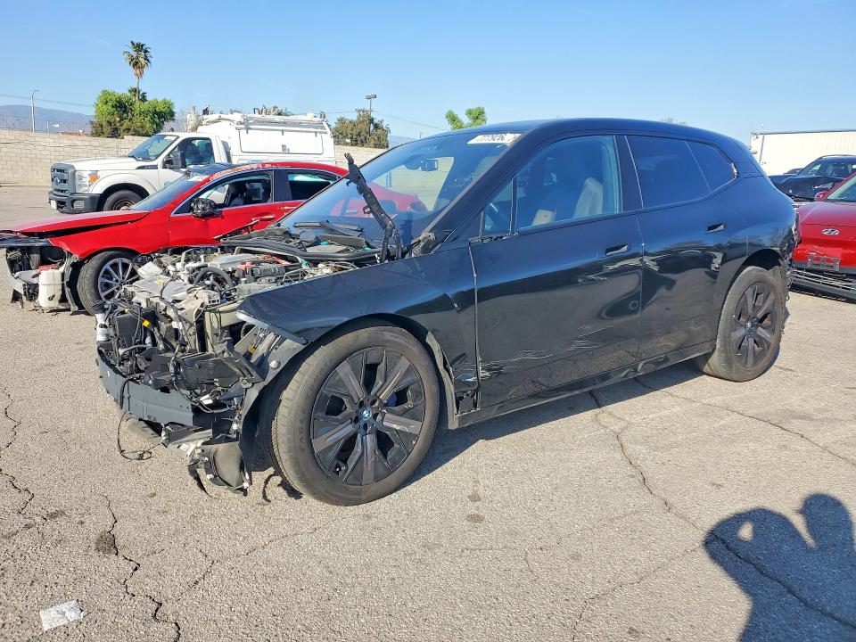 2024 BMW Ix VIN WB523CF04RCN52035 COPART salvage auction — FRONT END, Ca - Dis/Dlr/Exp Only Clean Title, sold $18,500 on 2026-07-20 (photo 1)
