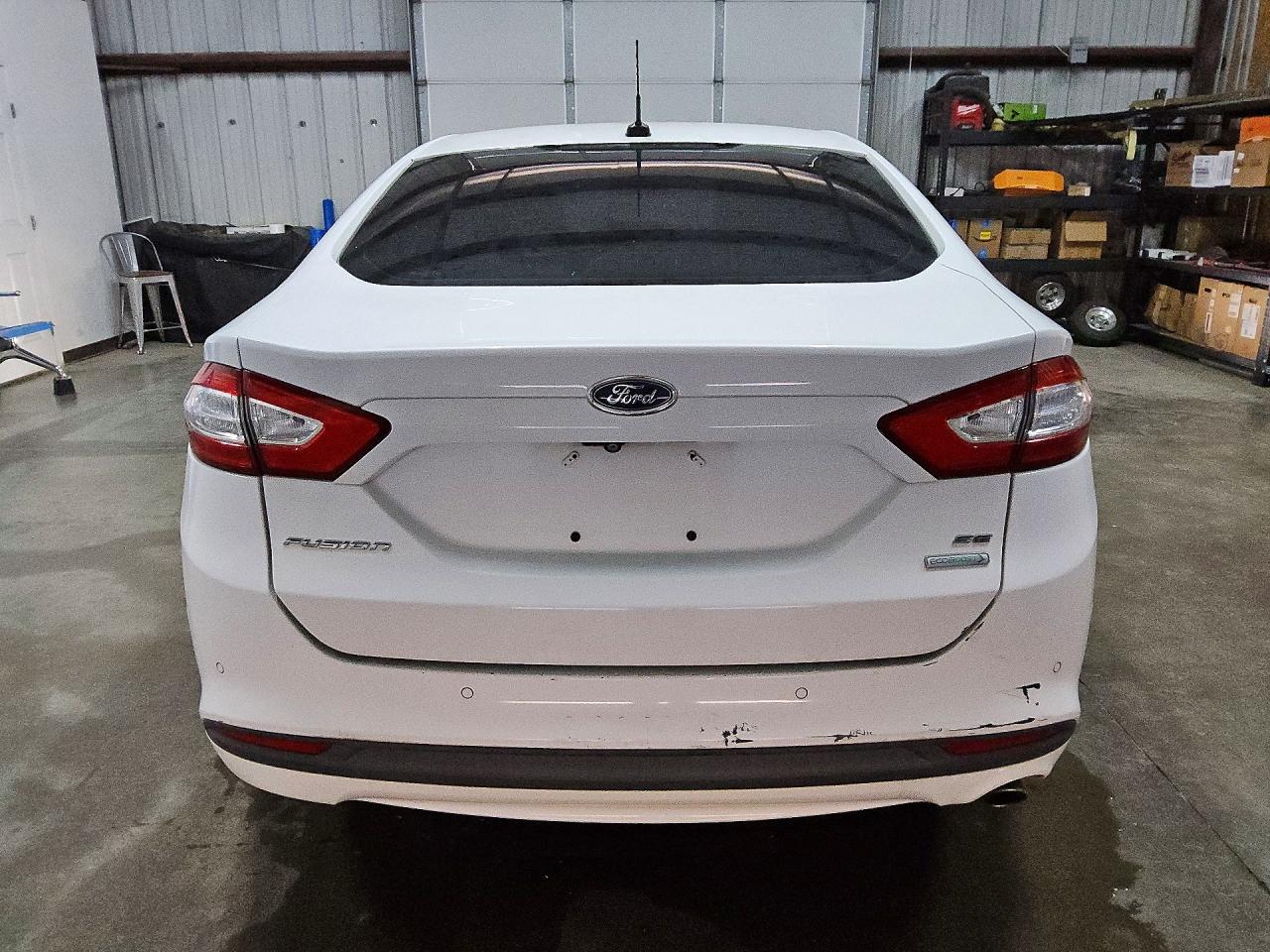 2016 Ford Fusion VIN 1FA6P0HD6G5121115 COPART salvage auction — Minor Dent/Scratches, TX - CERTIFICATE OF TITLE, sold $175 on 2026-06-30 (photo 6)