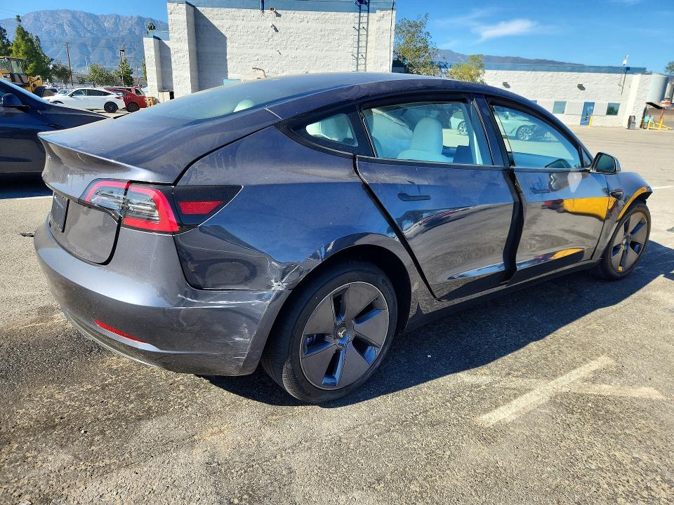 2023 Tesla Model 3 VIN 5YJ3E1EA1PF701227 COPART salvage auction — FRONT END, Salvage Title, sold $4,000 on 2026-07-09 (photo 3)
