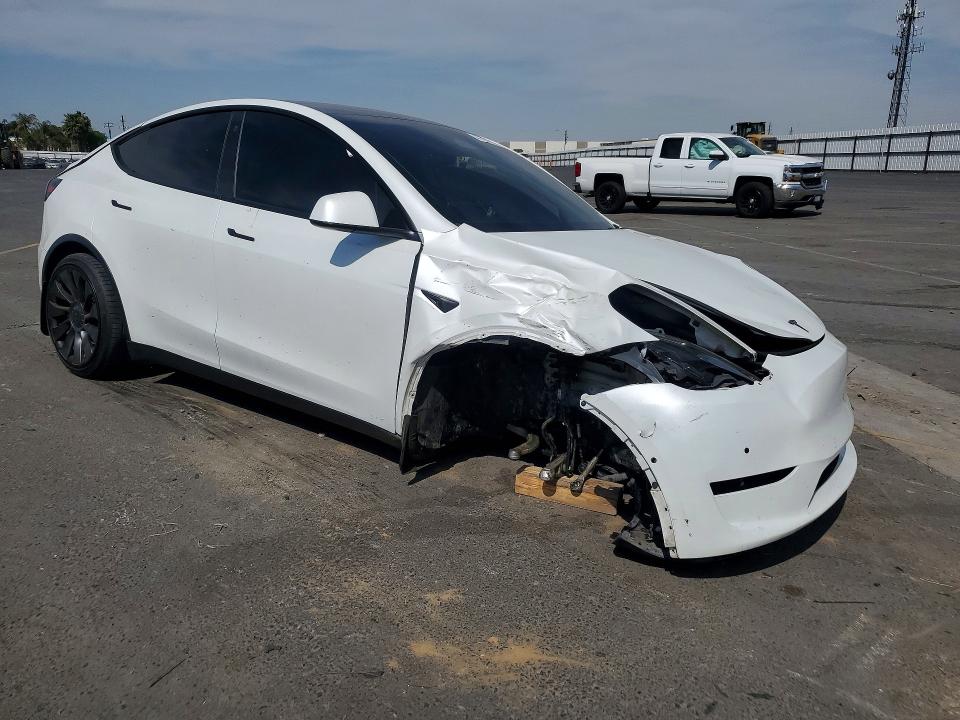 2022 Tesla Model y VIN 7SAYGDEF9NF522821 COPART salvage auction — FRONT END, Ca - Salvage Certificate, sold $4,100 on 2026-07-13 (photo 4)