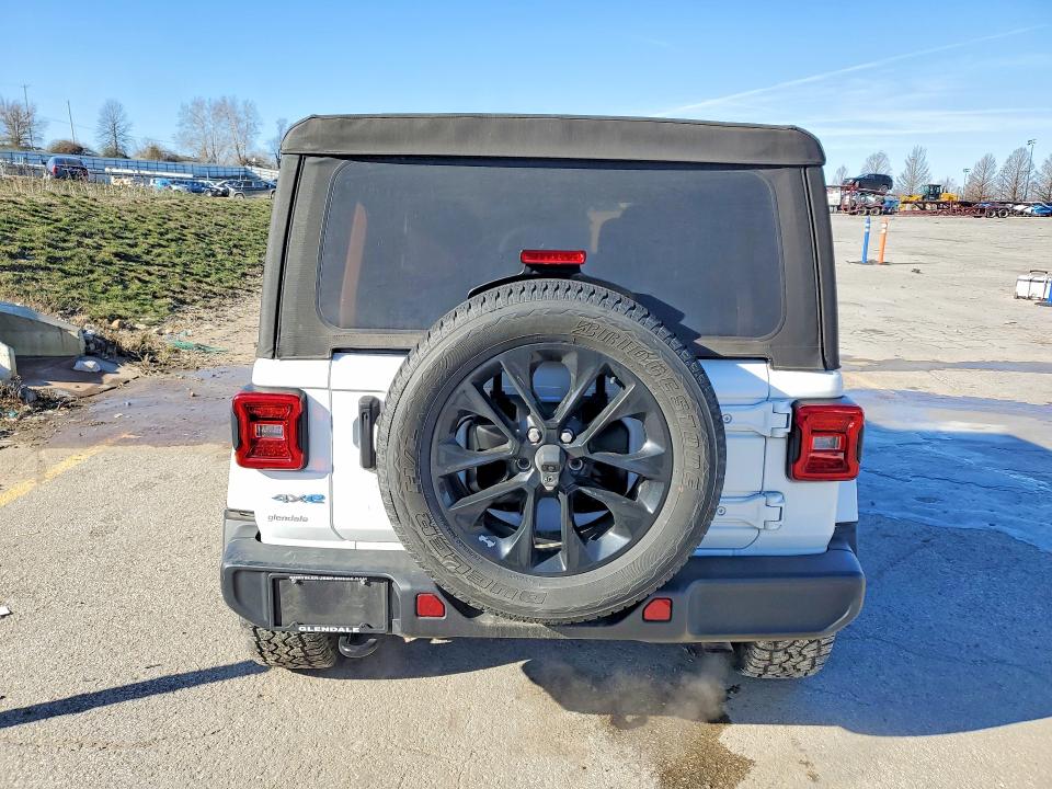2021 Jeep Wrangler / VIN 1C4JJXP65MW781881 COPART salvage auction — MINOR DENT/SCRATCHES, Mo - Certificate Of Title, sold $11,600 on 2026-07-09 (photo 6)