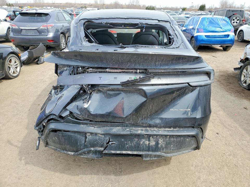 2026 Tesla Model y VIN XP7YGDEEXTB774125 COPART salvage auction — REAR END, On - Permit Salvage, sold $12,100 on 2026-08-04 (photo 6)