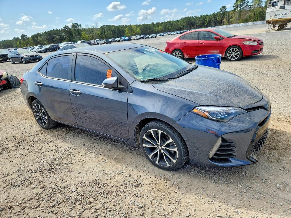2017 Toyota Corolla VIN 5YFBURHE6HP654231 COPART salvage auction — SIDE, Nc - Salvage Certificate Of Title, sold $3,900 on 2026-07-06 (photo 4)
