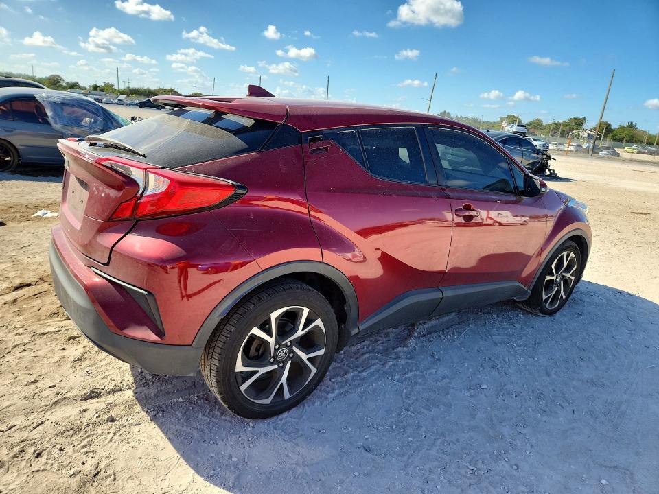 2018 Toyota C-hr VIN JTNKHMBXXJ1008164 COPART salvage auction — SIDE, Fl - Cert Of Title Slvg Rebuildable, sold $3,900 on 2026-08-01 (photo 3)