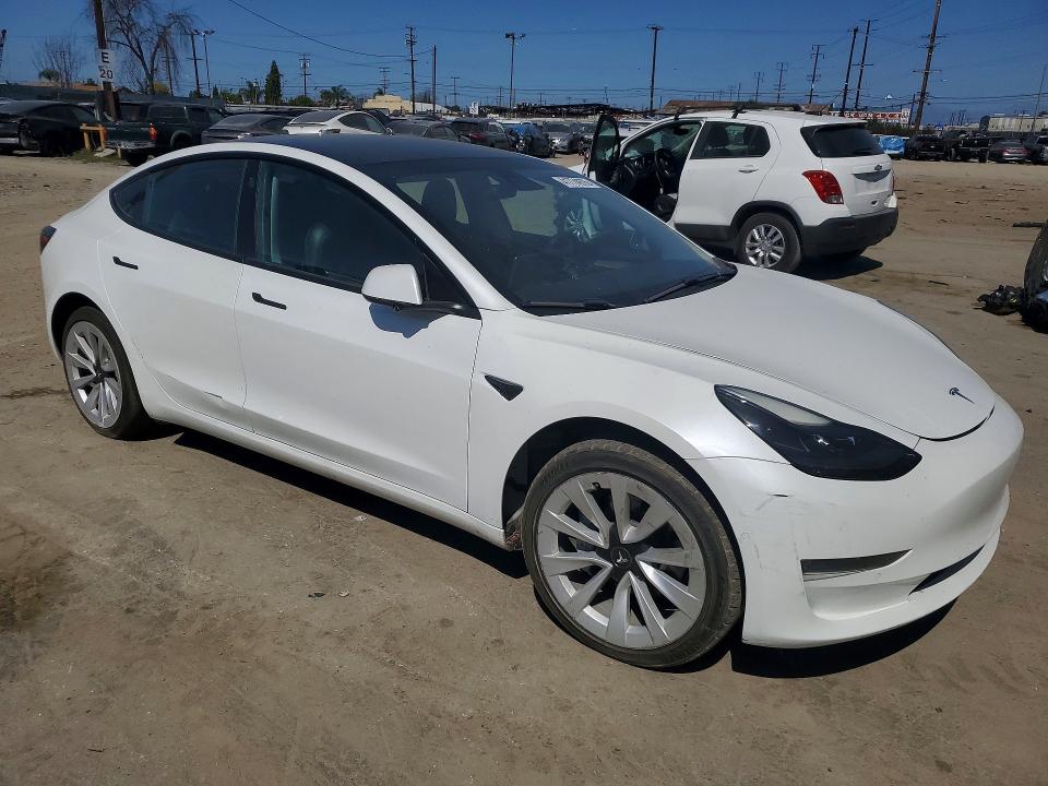 2021 Tesla Model 3 VIN 5YJ3E1EB7MF049640 COPART salvage auction — WATER/FLOOD, Ca - Salvage Certificate, sold $10,100 on 2026-07-27 (photo 4)