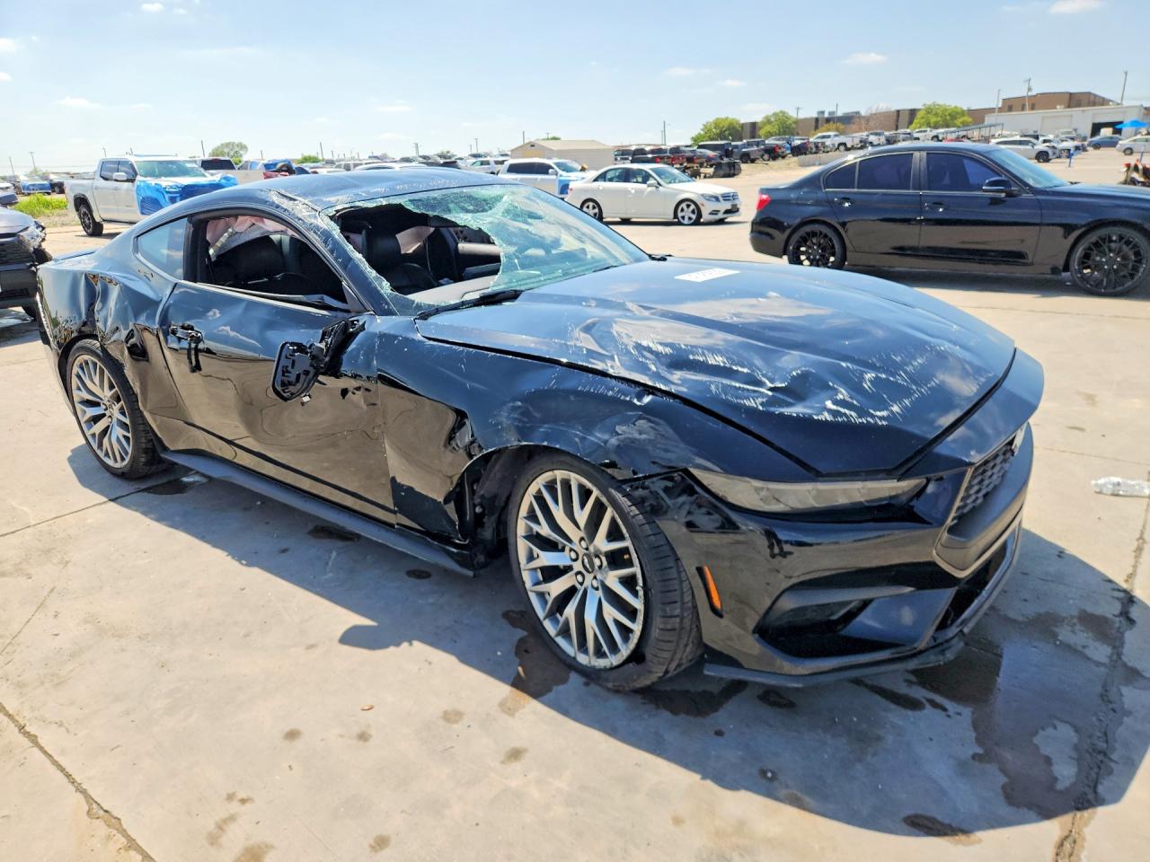 2025 Ford Mustang VIN 1FA6P8TH1S5121251 COPART salvage auction — Rollover, TX - CERTIFICATE OF TITLE, sold $6,400 on 2026-07-09 (photo 4)