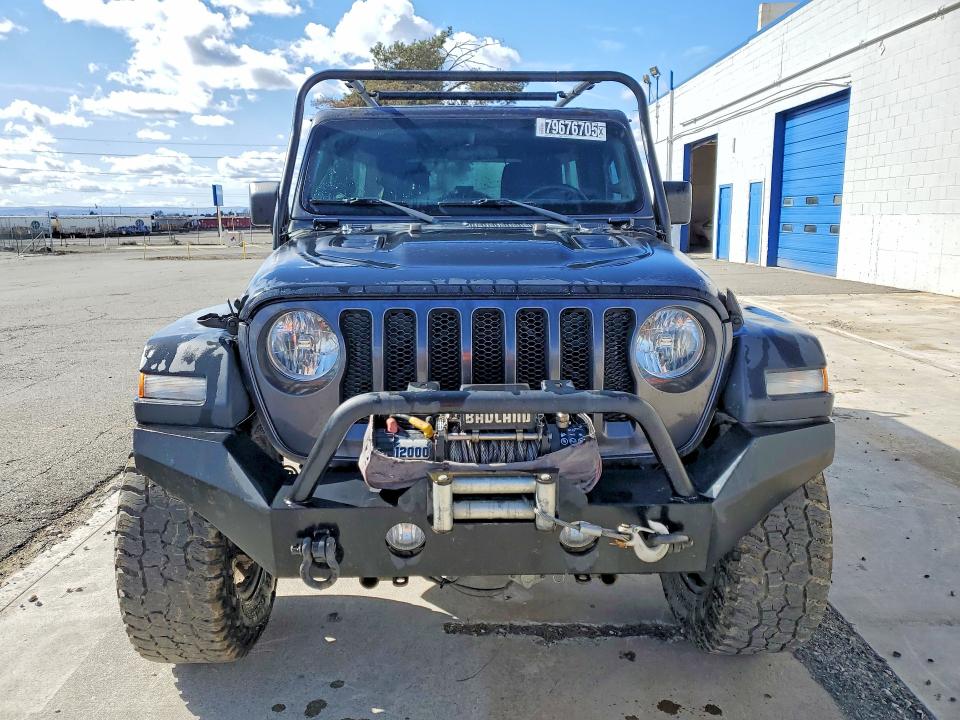 2018 Jeep Wrangler unlimited VIN 1C4HJXDGXJW198987 COPART salvage auction — MINOR DENT/SCRATCHES, Wa - Vehicle Cert Of Ownership-Titl, sold $14,100 on 2026-07-02 (photo 5)