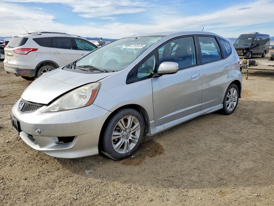 2011 Honda Fit VIN JHMGE8H52BC025867 COPART salvage auction — ROOF, Mt - Salvage Certificate Of A Vehic, sold $225 on 2026-07-07 (photo 1)