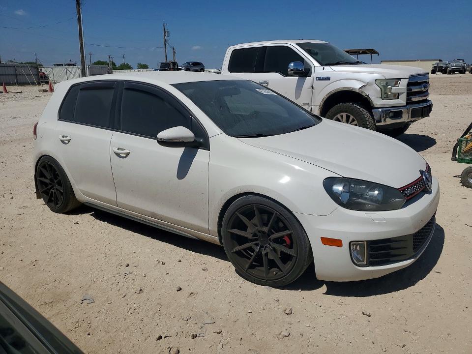 2013 Volkswagen Gti VIN WVWGV7AJ1DW121395 COPART salvage auction — MINOR DENT/SCRATCHES, Tx - Salvage Vehicle Title, sold $2,800 on 2026-07-02 (photo 4)