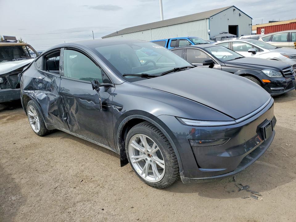 2026 Tesla Model y VIN XP7YGDEEXTB774125 COPART salvage auction — REAR END, On - Permit Salvage, sold $12,100 on 2026-08-04 (photo 4)