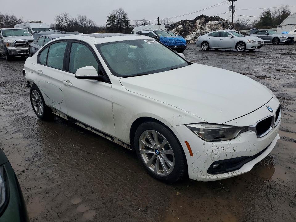 2018 BMW 3er VIN WBA8E5G50JNU47481 COPART salvage auction — REAR END, ID - SALVAGE CERTIFICATE OF TITLE, sold $1,700 on 2026-07-10 (photo 4)