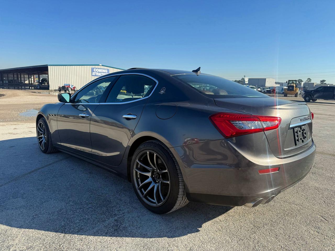 2017 Maserati Ghibli VIN ZAM57XSA9H1206127 COPART salvage auction — Damage History, Tx - Salvage Cert-Manufacturer Buyb (P), sold $25,000 on 2026-04-13 (photo 3)