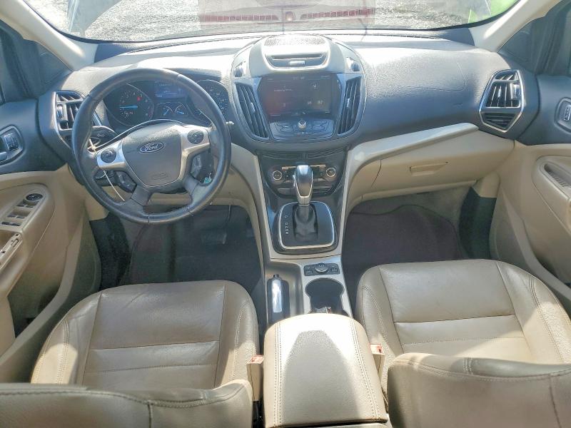 2013 Ford Escape VIN 1FMCU0HX4DUD49207 COPART salvage auction — NORMAL WEAR, Fl - Certificate Of Title (P), sold $400 on 2026-07-02 (photo 8)