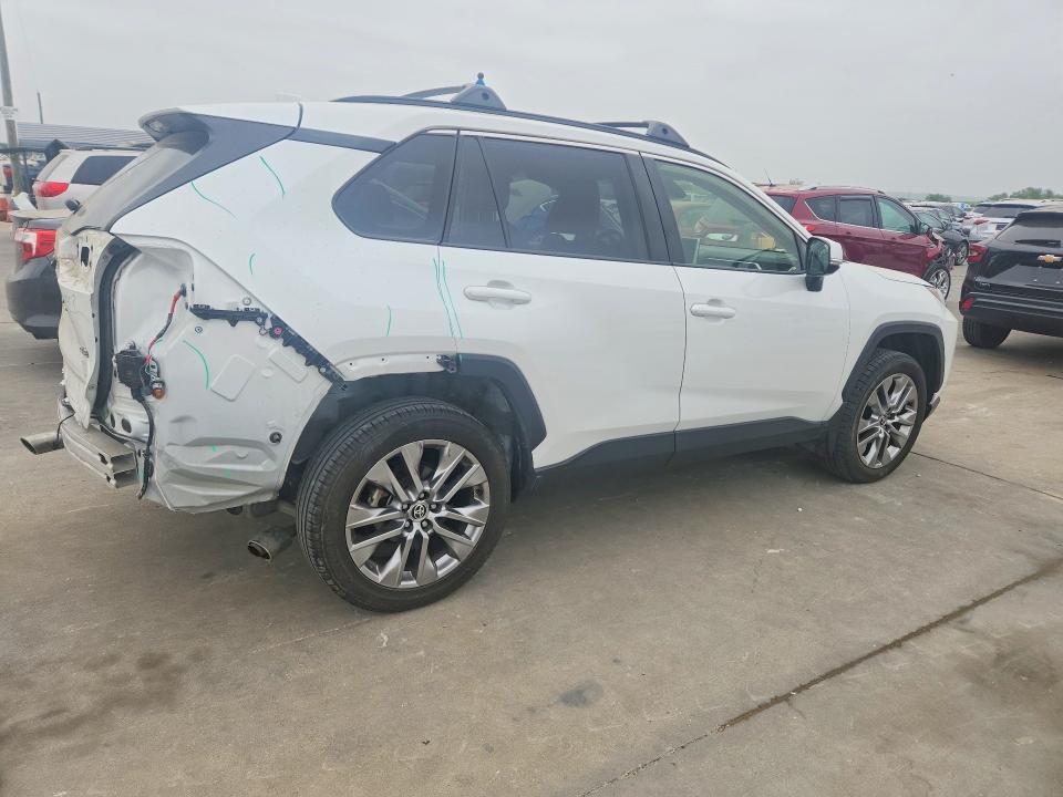 2023 Toyota Rav 4 VIN JTMC1RFV2PD112285 COPART salvage auction — REAR END, TX - SALVAGE VEHICLE TITLE, sold $16,600 on 2026-10-12 (photo 3)