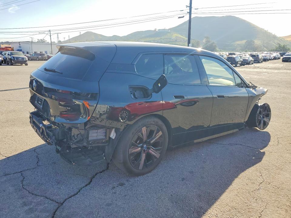 2024 BMW Ix VIN WB523CF04RCN52035 COPART salvage auction — FRONT END, Ca - Dis/Dlr/Exp Only Clean Title, sold $18,500 on 2026-07-20 (photo 3)