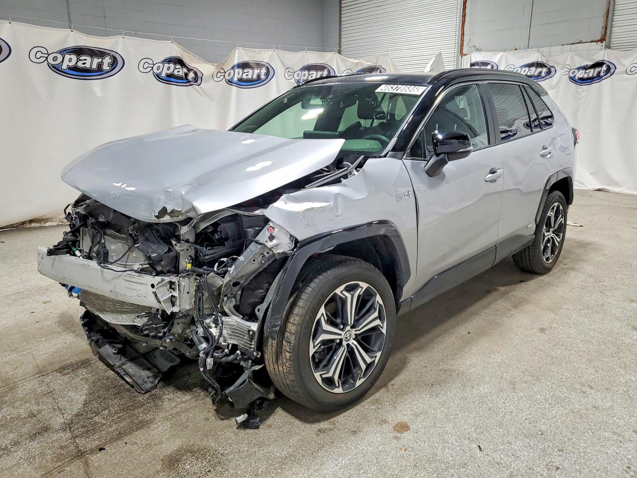 2024 Toyota RAV4 Prime VIN JTMEB3FV4RD233499 COPART salvage auction — Front End, IN - CERTIFICATE OF TITLE, sold $14,100 on 2026-07-09 (photo 1)