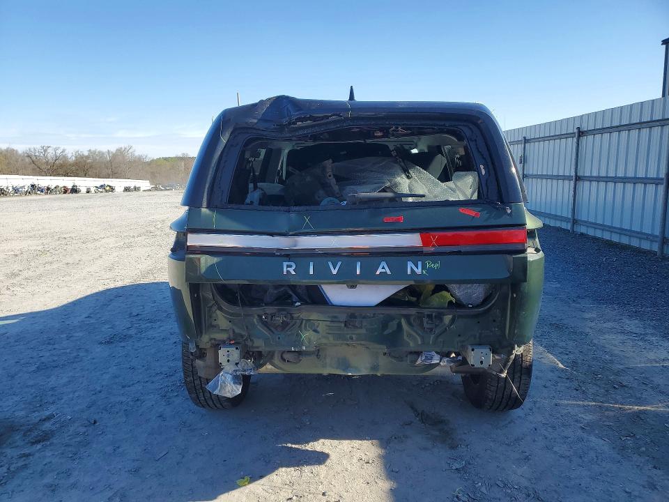 2024 Rivian VIN 7PDSGABA0RN033315 COPART salvage auction — REAR END, Nc - Salvage Certificate Of Title, sold $27,500 on 2026-07-08 (photo 6)