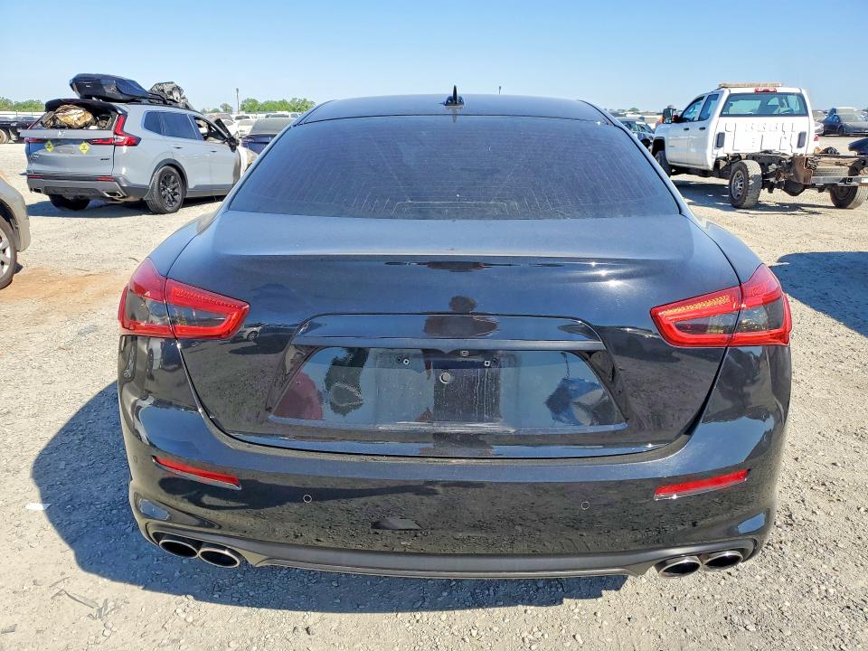2018 Maserati Ghibli VIN ZAM57YTA4J1301673 COPART salvage auction — SIDE, Fl - Derelict Vehicle Certificate, sold $20 on 2026-07-28 (photo 6)