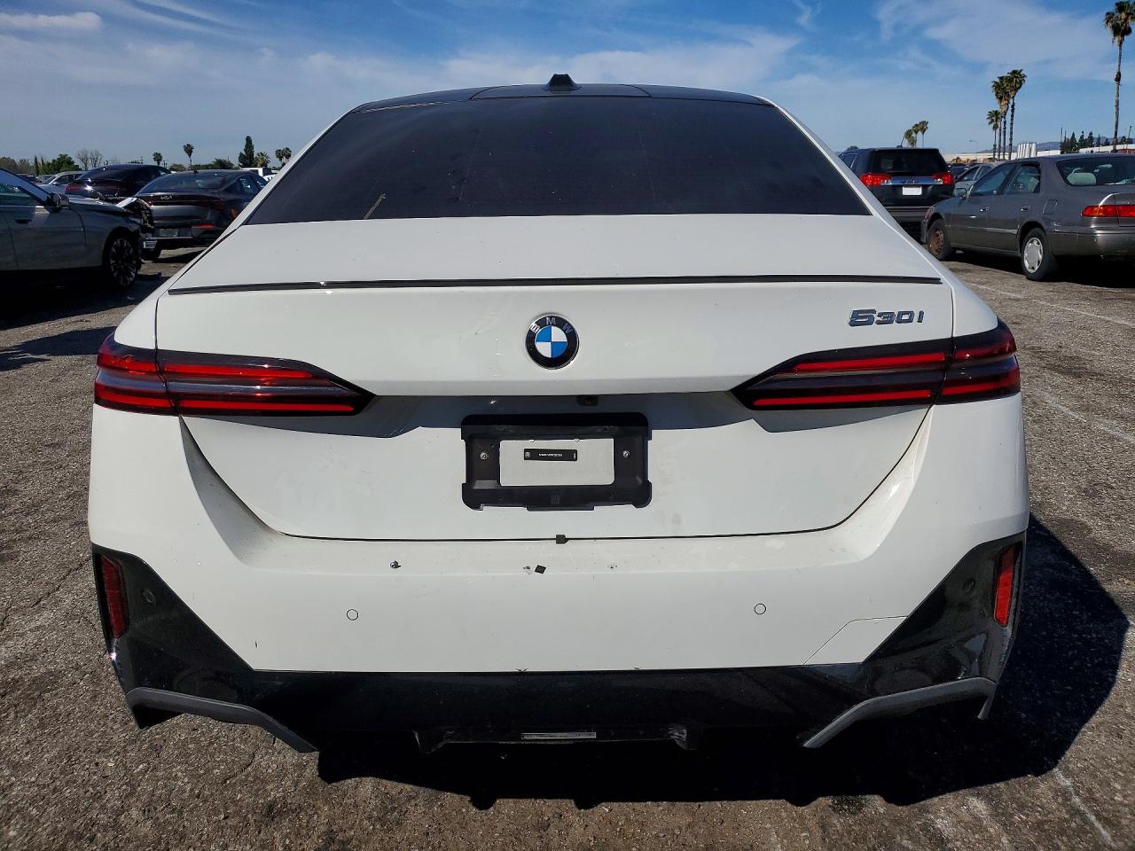 2024 BMW 5 Series VIN WBA43FJ07RCS27365 COPART salvage auction — Side, CA - SALVAGE CERTIFICATE, sold $37,750 on 2026-06-26 (photo 6)
