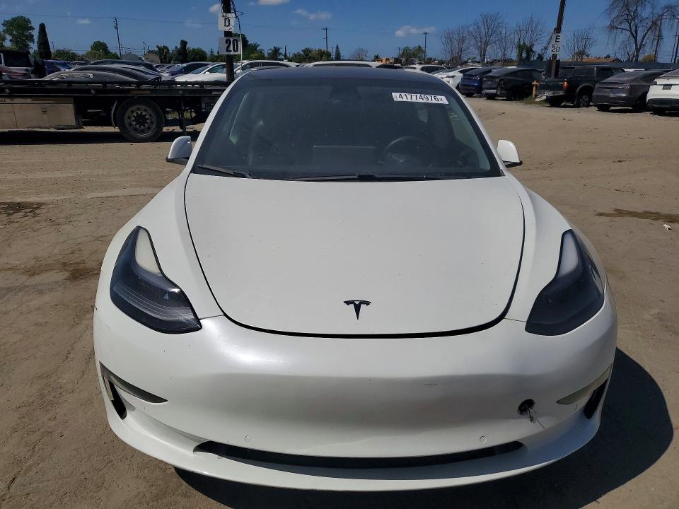 2021 Tesla Model 3 VIN 5YJ3E1EB7MF049640 COPART salvage auction — WATER/FLOOD, Ca - Salvage Certificate, sold $10,100 on 2026-07-27 (photo 5)