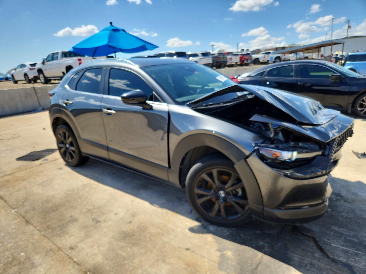2024 Mazda CX-30 VIN 3MVDMBBM6RM655533 COPART salvage auction — Front End, TX - SALVAGE VEHICLE TITLE, sold $4,150 on 2026-07-09 (photo 4)