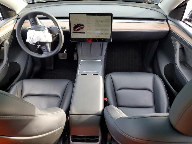 2025 Tesla Model y VIN 7SAYGAEE8SF243801 COPART salvage auction — FRONT END, Or - Salvage Title Certificate, sold $8,200 on 2026-07-13 (photo 8)