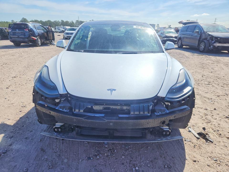 2021 Tesla Model 3 VIN 5YJ3E1EA4MF099564 COPART salvage auction — ALL OVER, Tx - Salvage Vehicle Title, sold $4,700 on 2026-07-10 (photo 5)
