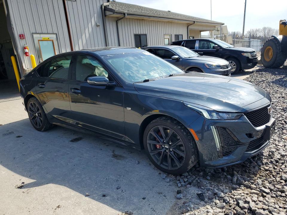 2021 Cadillac Ct5 VIN 1G6DU5RK3M0114655 COPART salvage auction — SIDE, Wv - Salvage Certificate, sold $5,800 on 2026-08-25 (photo 4)