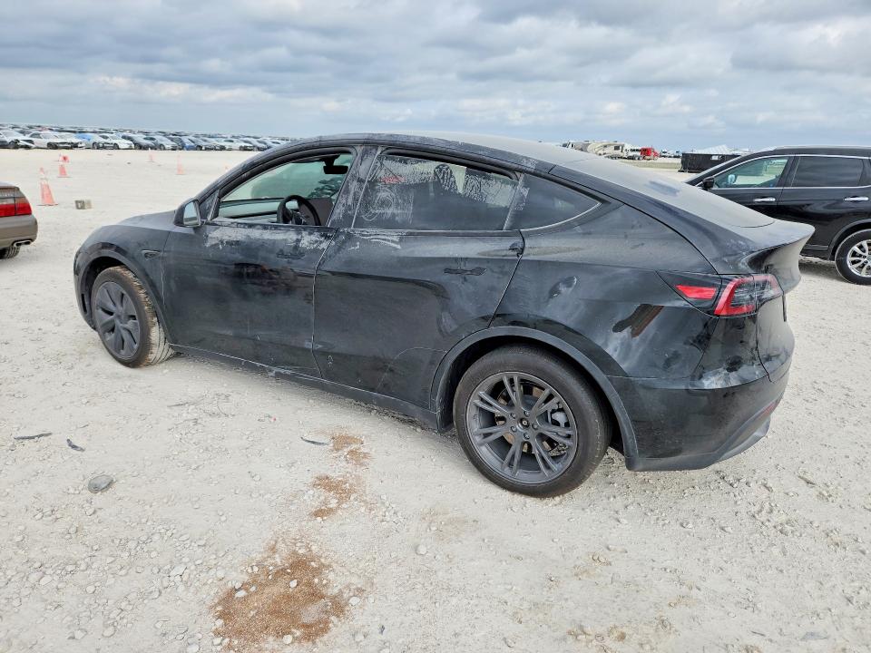 2024 Tesla Model y VIN 7SAYGAEE8RF116654 COPART salvage auction — SIDE, Tx - Salvage Vehicle Title, sold $13,000 on 2026-07-16 (photo 2)