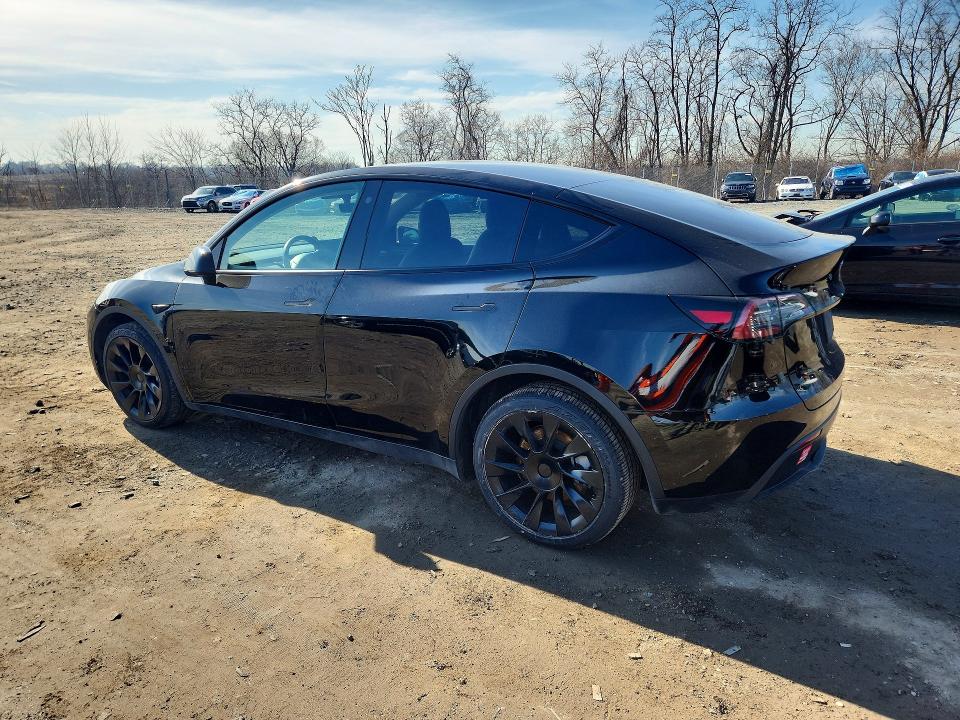 2023 Tesla Model y VIN 7SAYGDEE3PF607258 COPART salvage auction — REAR END, Id - Salvage Certificate Of Title, sold $12,600 on 2026-07-09 (photo 2)