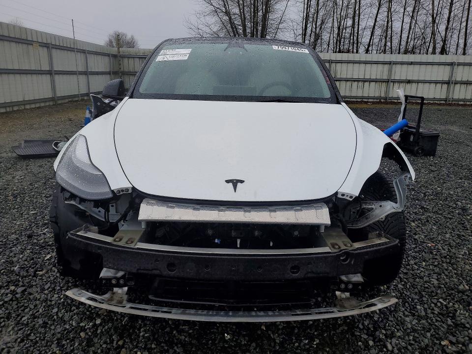 2023 Tesla Model y VIN 7SAYGDEE4PF628247 COPART salvage auction — SIDE, Salvage Title, sold $10,700 on 2026-07-13 (photo 5)