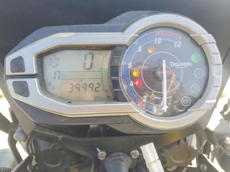 2013 Triumph motorcycle Tiger VIN SMTE05BF5DT577214 COPART salvage auction — SIDE, CA - SALVAGE CERTIFICATE, sold $1,650 on 2026-07-08 (photo 7)