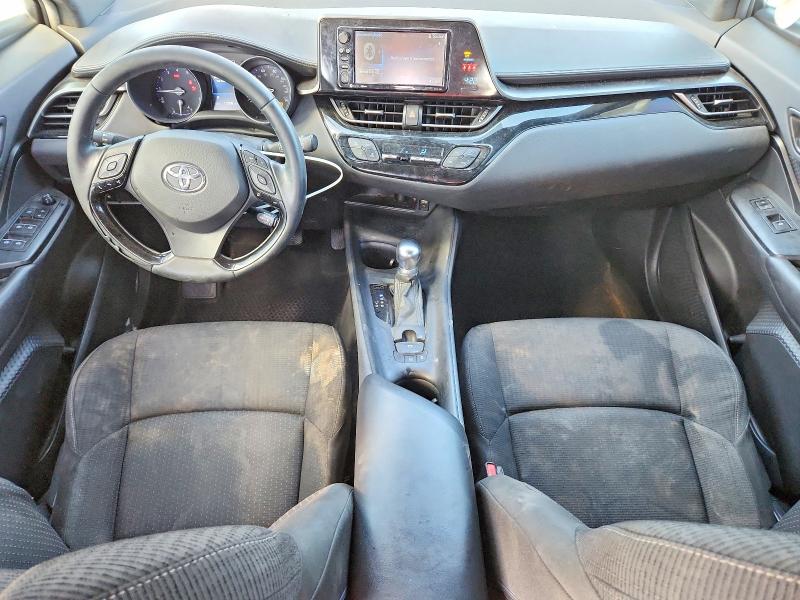 2018 Toyota C-hr VIN JTNKHMBXXJ1008164 COPART salvage auction — SIDE, Fl - Cert Of Title Slvg Rebuildable, sold $3,900 on 2026-08-01 (photo 8)