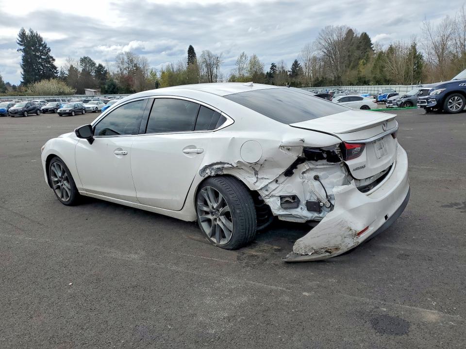 2015 Mazda VIN JM1GJ1W50F1216356 COPART salvage auction — REAR END, ID - SALVAGE CERTIFICATE OF TITLE, sold $2,050 on 2026-07-08 (photo 2)