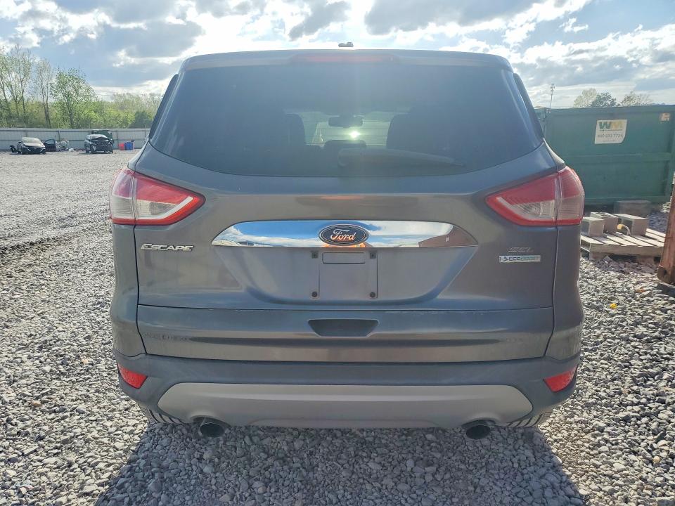 2013 Ford Escape VIN 1FMCU0HX4DUD49207 COPART salvage auction — NORMAL WEAR, Fl - Certificate Of Title (P), sold $400 on 2026-07-02 (photo 6)