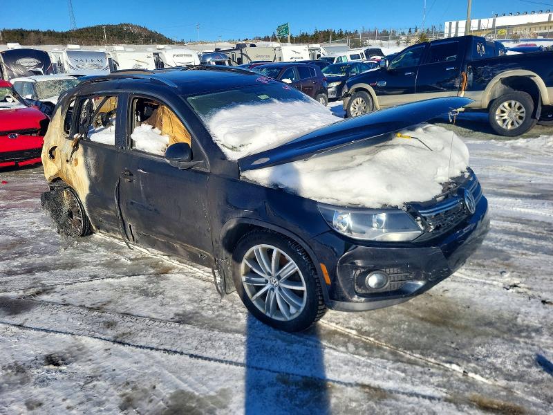 2016 Volkswagen Tiguan VIN WVGJV7AX8GW500565 COPART salvage auction — BURN, Nl - Non-Repairable, sold $80 on 2026-08-06 (photo 4)