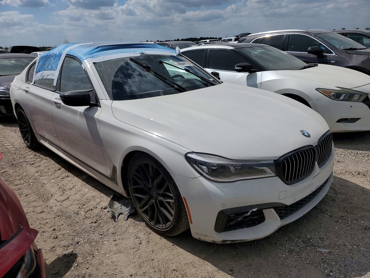 2019 BMW 7 Series VIN WBA7F2C58KB239932 COPART salvage auction — Water/Flood, TX - SALVAGE TITLE-FLOOD DAMAGE, sold $4,050 on 2026-07-02 (photo 4)