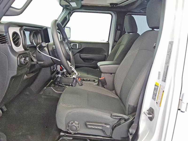 2025 Jeep Wrangler / VIN 1C4PJXDN3SW552358 COPART salvage auction — MINOR DENT/SCRATCHES, Tx - Certificate Of Title, sold $23,500 on 2026-07-09 (photo 7)