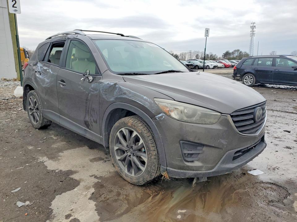 2016 Mazda Cx-5 VIN JM3KE4DY7G0798600 COPART salvage auction — SIDE, Va - Cert Of Title - Salvage, sold $3,750 on 2026-07-15 (photo 4)