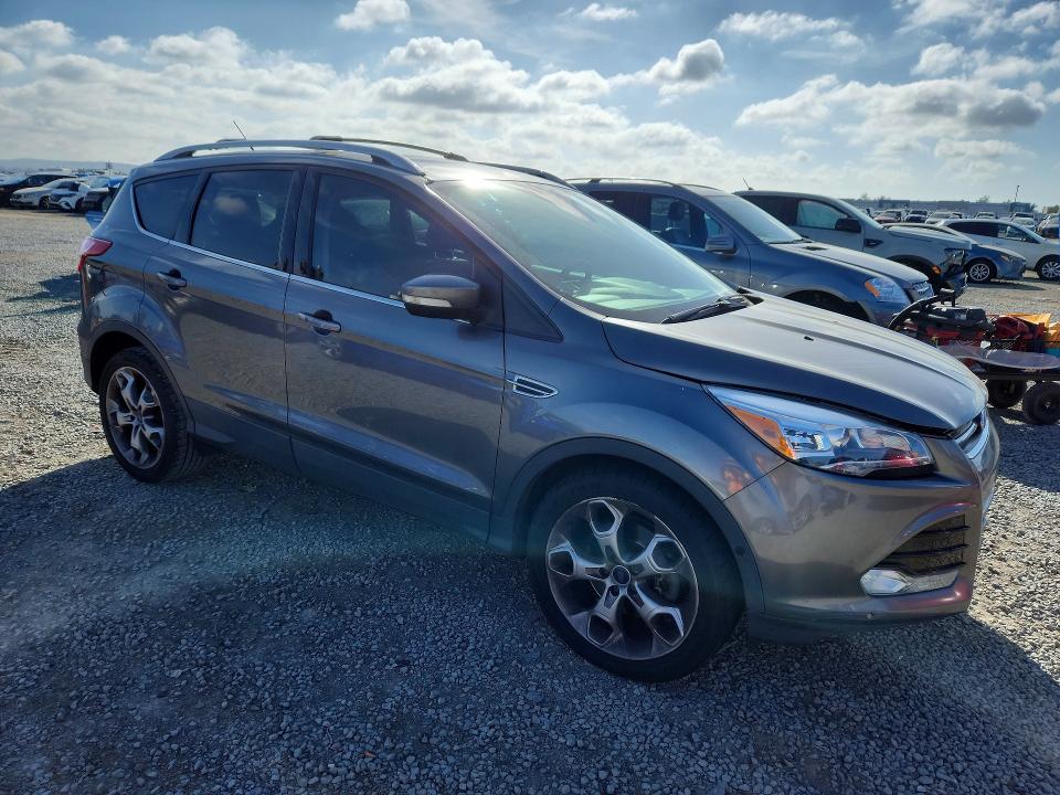 2014 Ford Escape VIN 1FMCU0J97EUE13530 COPART salvage auction — MINOR DENT/SCRATCHES, Sc - Dis/Dlr/Exp Only Clean Title, sold $1,350 on 2026-07-02 (photo 4)