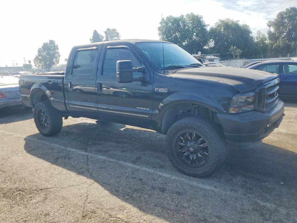2000 Ford F250 VIN 3FTNW20F1YMA57143 COPART salvage auction — MINOR DENT/SCRATCHES, Ca - Dis/Dlr/Exp Only Clean Title, sold $1,550 on 2026-07-02 (photo 4)